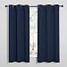 NICETOWN Light Blocking Thermal Insulated Solid Grommet Top Blackout Curtains/Drapes/Panels for Kid's Room (Navy Blue, 1 Pair,42 x 63 Inch)