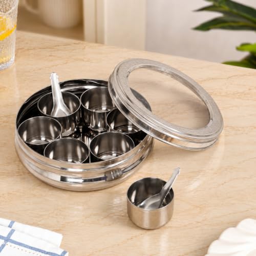 Image of Nestasia Stainless Steel Masala Dabba for Kitchen Storage (90ml x 7 Containers) - Engraved Spice Box with See Through Lid & Spoon | Rust-Free & Diswasher Safe Garam Masala & Biryani Masala Dani
