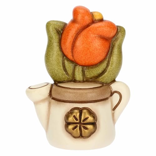 Il mini annaffiatoio in ceramica con tulipano è un omaggio alla grazia e all'eleganza; simbolo di bellezza e rinnovamento, questa bomboniera cattura l'essenza della primavera; ottimo per eventi speciali, emoziona e sorprende con il suo fascino unico