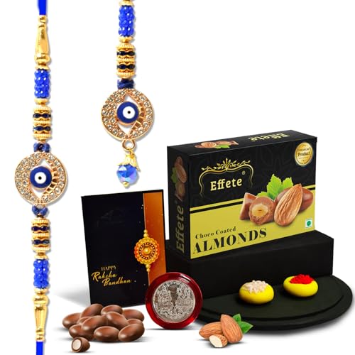 Image of Oblivion Rakhi Combo for Bhai and Bhabhi with 32g Chocolate Almonds, Silver Pooja Coin, Roli, Chawal and Greeting Card - Raksha Bandhan Festival Gift Set