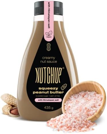 NUTCHUP | Pierwsze wyciskane masło orzechowe nabite w butelkę | Kremowa polewa orzekowa | Butelka 435g (Kawałki Orzechów)