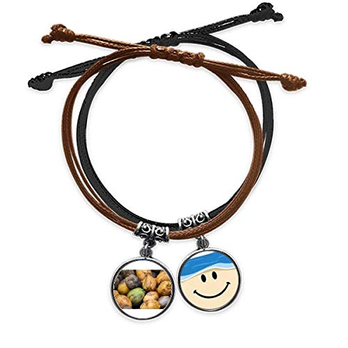 Pulsera de cuerda artesanal con foto de papaya y acabados de cuero detallados