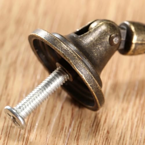 Tirador de bronce para sustituir pomos desgastados en armarios de cocina 6