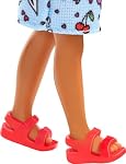 Barbie Chelsea Doll, Small Doll Wearing Removable Blue Dress with Colorful Print & Pink Shoes, Brown Hair & Green Eyes