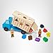 Melissa & Doug Shape-Sorting Wooden Dump Truck Toy with 9 Colorful Shapes and 2 Play Figures Wooden Vehicle Toys, Shape Sorter Toys for Toddlers Ages 2+