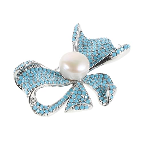Broche nœud bleu en calaïte idéale pour rehausser un pull ou un manteau lors d'une soirée