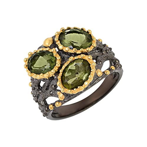 Anillo de moldavita verde de plata hecho a mano facetado con bisel elegante