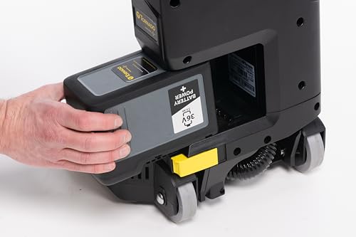 cordless upright vacuum in use