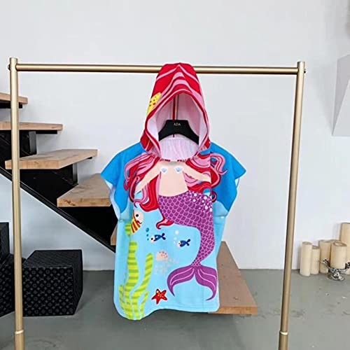 Peignoir serviette de plage pour enfants après la baignade à la mer