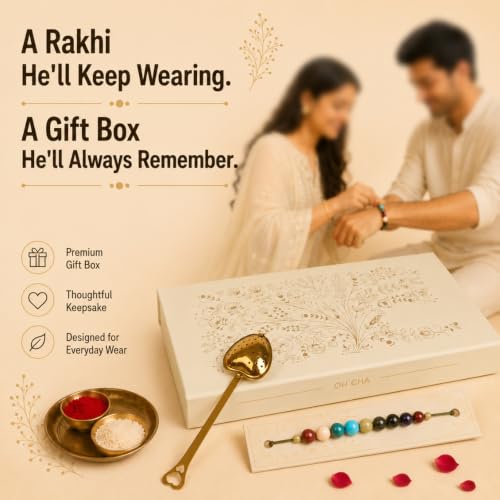 Image of OH CHA - NOOR Luxury Rakhi Gift Box for Brother | Contains 7 CHAKRA Rakhi (7 Stones), 6 Assorted Items in Borosilicate Glass Tubes - Chamomile Tea, Darjeeling Tea, Jaggery Powder, Almonds, Flavoured Saunf & Masala Raisins + Stainless Steel Infuser, Roli Chawal | rakhi gift hamper for brother | Rakshabandhan Gift