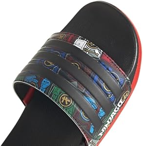 شبشب سلايدز بشريط ملون وطبعة كلمة نينجا جو للاطفال من اديداس Adilette  Comfort X LEGO - اسود كور واحمر، 38 EU : Amazon.eg: ملابس وأحذية ومجوهرات