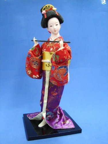 Muñeca japonesa Geisha con flauta miniatura 1