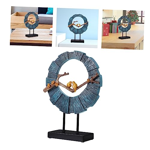 Oiseau sur branche en résine Cabilock pour décoration de table