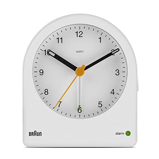Braun Classic Analogue Alarm Clock with Snooze and Continuous Backlight, Quiet Quartz Movement, Crescendo Beep Alarm in White, Model BC22W.
