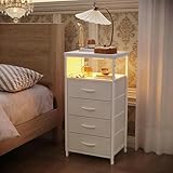 Meuble pratique et moderne : avec ses dimensions compactes de 40 x 30 x 79,5 cm, cette armoire de rangement en tissu offre une solution parfaite pour les petits espaces où un espace de rangement supplémentaire est nécessaire. L'éclairage LED pratique et les poches de rangement latérales rendent l'armoire non seulement fonctionnelle, mais aussi un meuble moderne qui donne à votre pièce une atmosphère élégante et bien rangée.