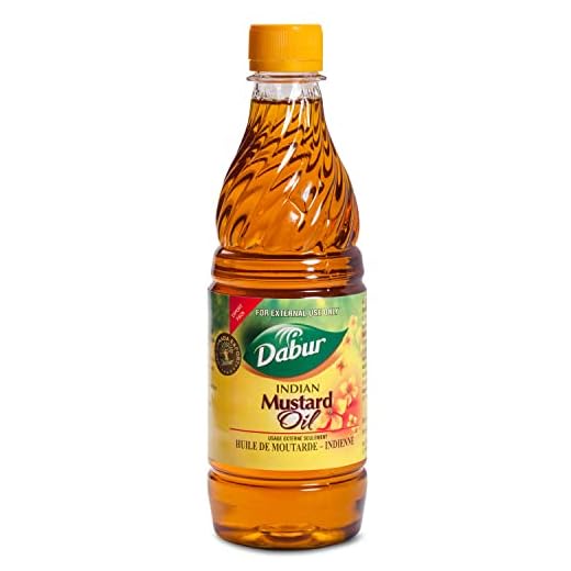 Dabur Kachi Ghani Mustard Oil - Oil for Skin and Hair Care, Cold-Pressed Oil Body Massage, Therapeutic-Grade Mustard Oil, Natural Oil from Mustard Seeds, Unrefined Mustard Oil (500 ml)