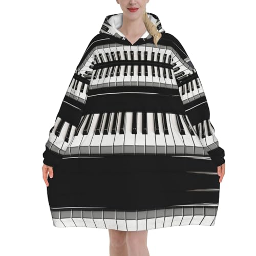 Sweat plaid touches de piano fini le froid avec cette couverture géante