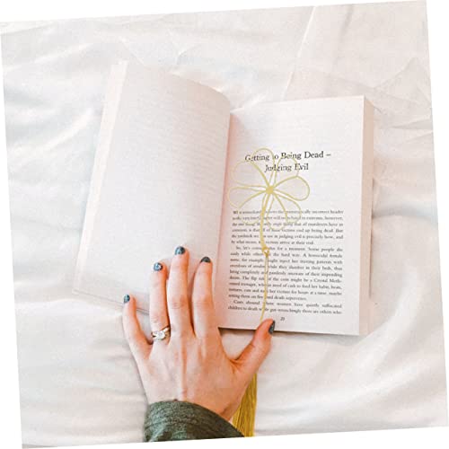 Marque-page pompon Lurrose en laiton pour vos moments lecture cocooning