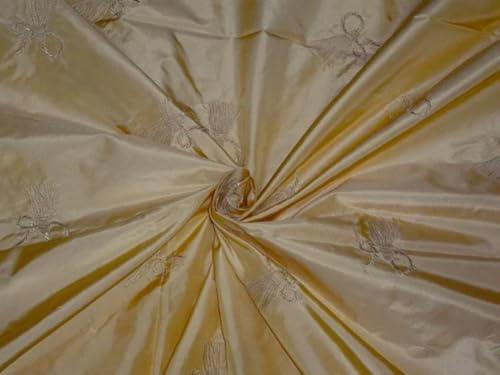 Taffetas de soie doré de 137 cm pour créer une robe de soirée majestueuse