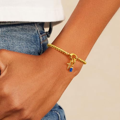 Free bird Cross Birthstone Bracelet | Dainty 14K Gold Plated Cross Charm Bracelet for Women | Stretchable Elastic Gold Beaded Bracelet | Stackable Trendy Birthstone Bracelet | Jewelry Gifts for Women4