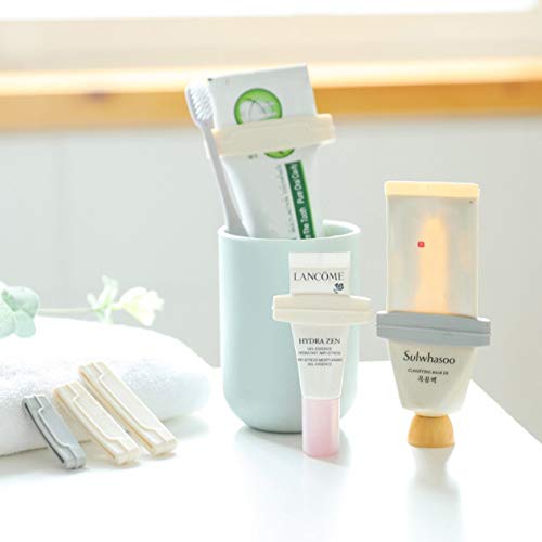 Preisvergleich Produktbild IronHeel Zahnpasta-Quetscher Squeeze Zahnpastatube Kosmetik Cleanser Extruder Clamps Zahnpastaspender Zahnpastaklammer - Farbe zufällig