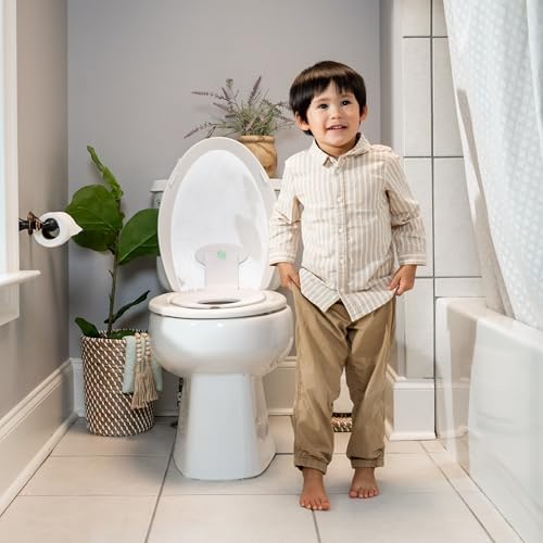 Ingenuity: ity by Ingenuity Flip & Sit Potty Seat (White) β Easy to Set Up & Remove Potty Training Seat That Attaches to Adult Toilet Seat - 1