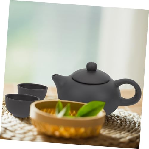Tetera de arcilla morada con aislamiento térmico y tazas con filtro integrado 7