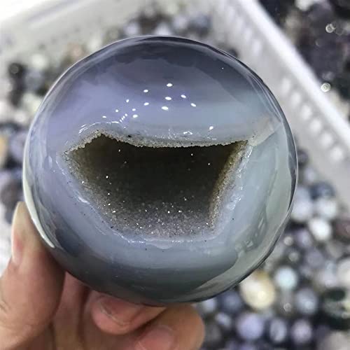 Pierre de cristal en boule d'agate transparente d'exception avec géode naturelle