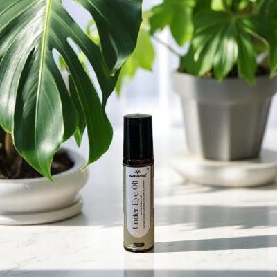 AabhaVeda Herbal Under Eye Oil - Brighten, Soothe, and Rejuvenate | Dark Circle Reduction | Puffiness Relief | Wrinkle Smoothing | Natural Botanical Ingredients | Gentle for All Skin Types - 10ML 2