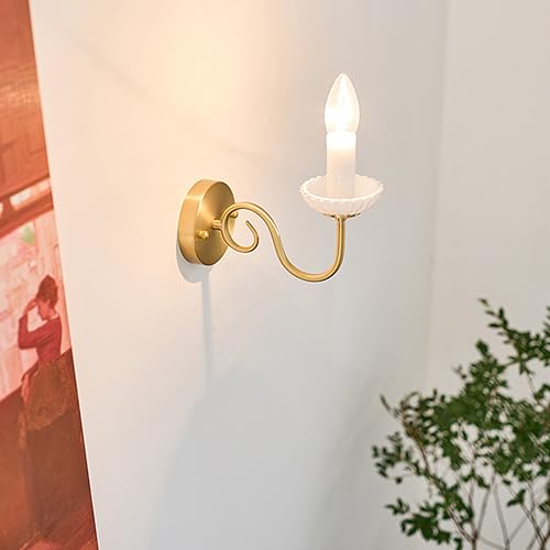 Apliques de pared de latón para dormitorio creando un ambiente cálido y sofisticado 2