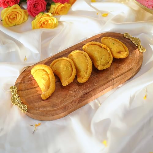 Image of BEHOMA Mango Wood Oval Serving Platter, Brass Motif, 32cm | Mango wood oval platter with brass motif, 32cm; festive serveware for Durga Puja & Navratri decor.