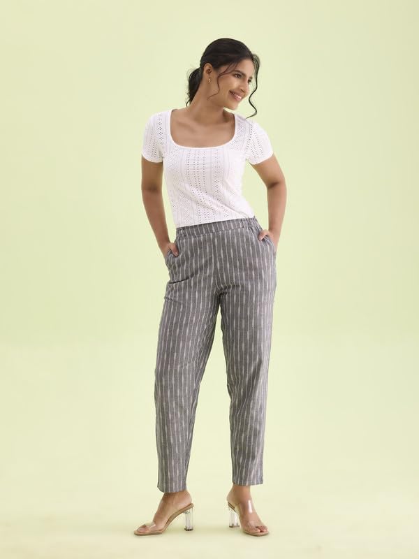 Image of GO COLORS Ikat Print Beige Printed Pencil Pant for Women | Breathable, Side Pocket