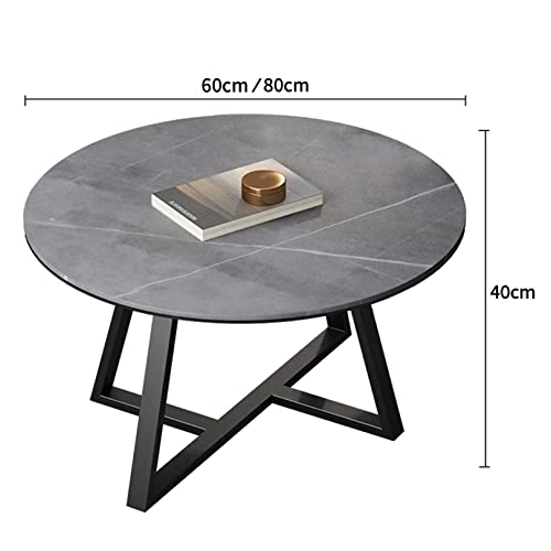 Table basse ronde de salon compacte pour aménager un petit appartement moderne