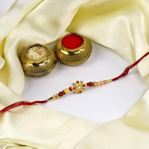 Image of Oblivion Ganesha Motif Rakhi Set of 2 for Brother with Oval Leaf Silver Colour Coin Design, Pooja Coin, Tilak Set and Greeting Card for Raksha Bandhan