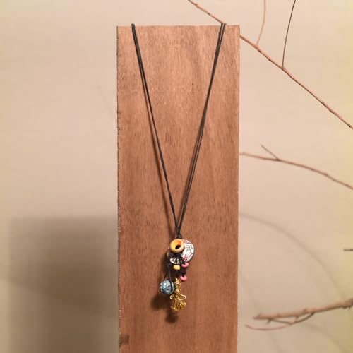 Image of AAKRITI ART CREATIONS Handcrafted Tribal & Boho Ethnic Necklace Collection | Floral, Mandala, Tassel & Dhokra Pendant Designs | Artisan Brass, Wood & Statement Jewelry for Women