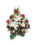 Soporta muy bien las inclemencias del tiempo, las flores se sellan al soporte para que aguanten viento y lluvia. Lleva peso en la base para que no se vuelque con el aire.