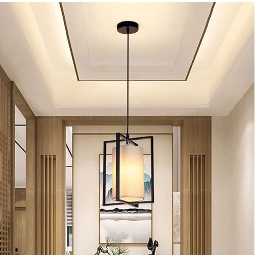 Lampe suspendue fer forgé pour optimiser l'éclairage d'une petite chambre