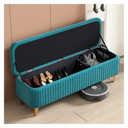 Banc de rangement en velours pour optimiser l'espace du salon