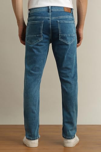 Image of Peter England Men's Slim Tapered Jeans | Heavy Wash Denim | Casual Wear | Modern Fit