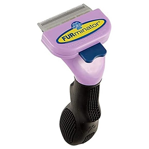 FURminator - Strumento per rimozione del sotto pelo per Gatti a Pelo Corto