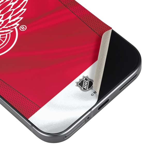 Skinit Decal Phone Skin Compatible with Google Pixel 9a - Officially Licensed NHL Detroit Red Wings Home Jersey Design