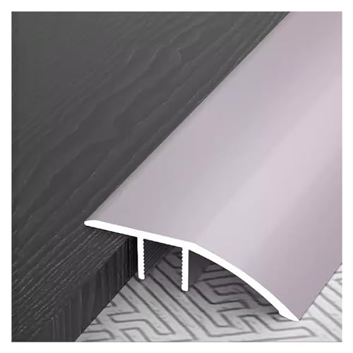 Bandes de transition de sol pour harmoniser le carrelage et le bois du salon