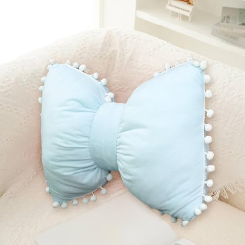 Coussin bleu à nœud papillon décoratif et moelleux pour dossier