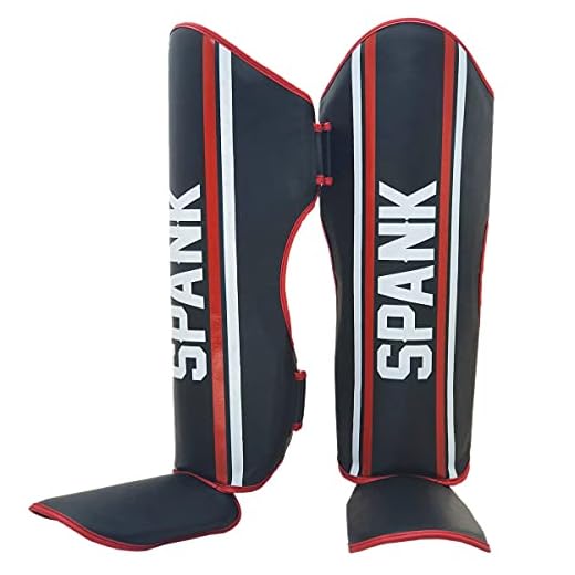 Caneleira Profissional com Protetor de pé Sparring Muay Thai Kickboxing Spank (M)