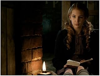 The Book Thief with Sophie Nelisse as Liesel Meminger Reading Book by Candle 8 x 10 Inch Photo