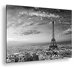 Livraison rapide et sûre Tour Eiffel dans l\'éclat doré du coucher de soleil sur Paris, la ville de l\'amour. Format : 100 x 70 cm Effet : noir et blanc comme image sur toile, motif encadré sur cadre en bois véritable,