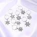FAERLIIRY Christmas Wine Glass Charms Set of 9 Christmas Snowflake Wine Charms for Steam Glasses Markers Drink Identifiers Tags for Cups Festival Wines Tasting Party Supplies(Snowflake)