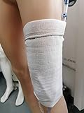 Vendaje para la pierna con un hueco para poder pasar el tubo, abrir la bolsa y vaciarla.