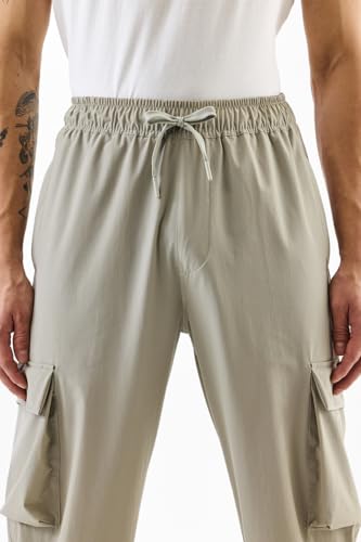 Image of SNITCH Men Cargo Pants | Relaxed Fit with Elastic Waistband & Drawstring | Durable Nylon Elastane Blend & Multiple Utility Pockets for Casual & Streetwear Occasions