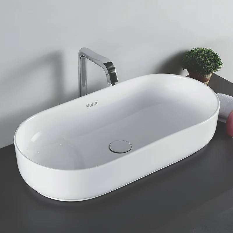 Ruhe® 28x14x6 Inches Navi Table-Top Wash Basin, Glossy Finish, White Ceramic, Countertop Installation, Oval Shape, Easy to Clean, Modern Bathroom Sink, Heat & UV Resistant Wash Basin (B0CTKN5NBT) Amazon Price History, Amazon Price Tracker